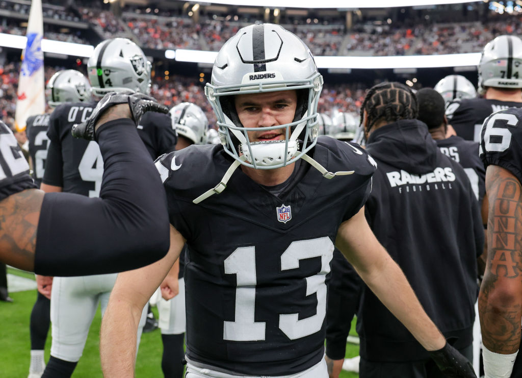 Wide receiver Hunter Renfrow #13 of the Las Vegas Raiders is greeted by teammates during player int...