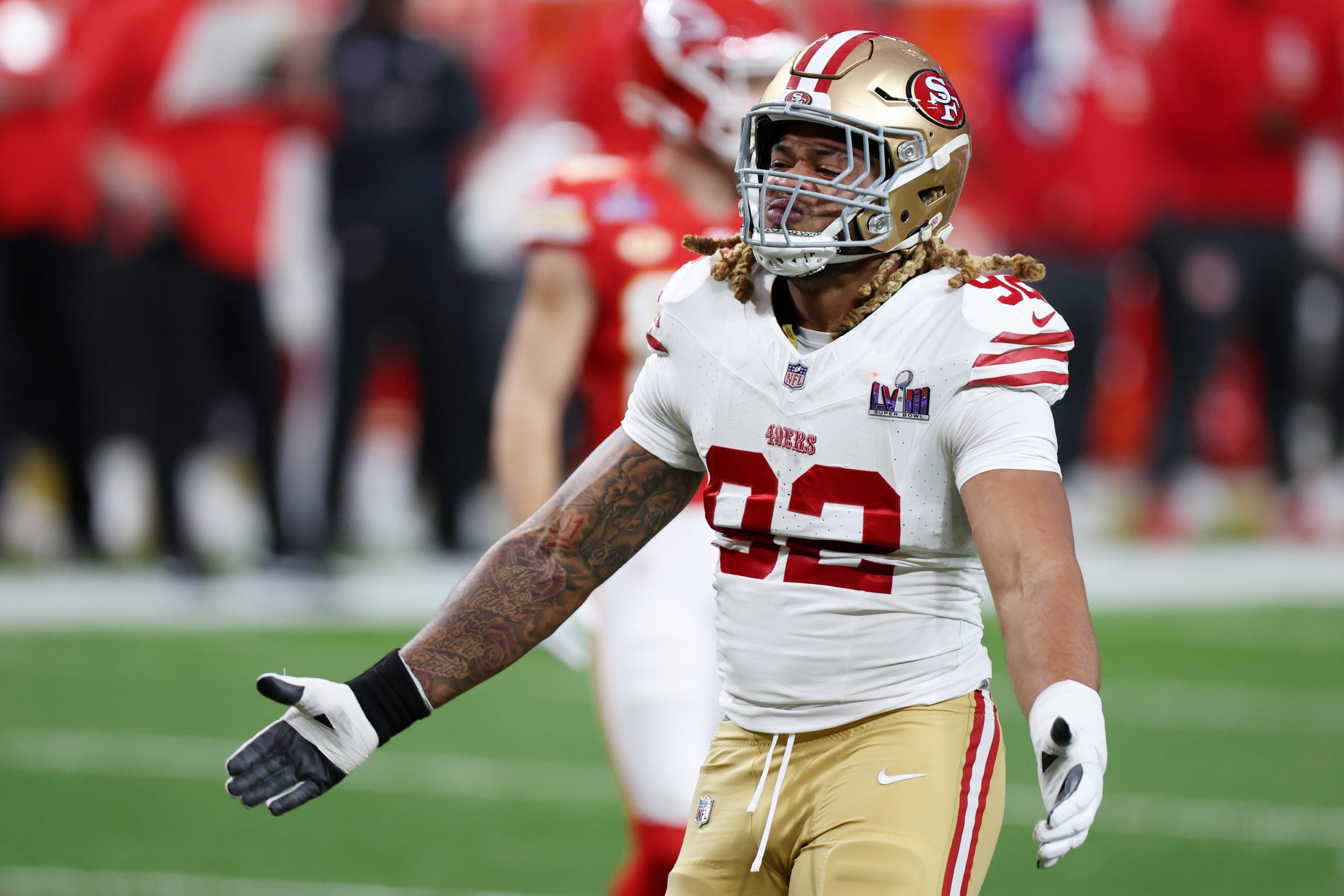 Chase Young #92 of the San Francisco 49ers reacts after a sack during the first quarter against the...