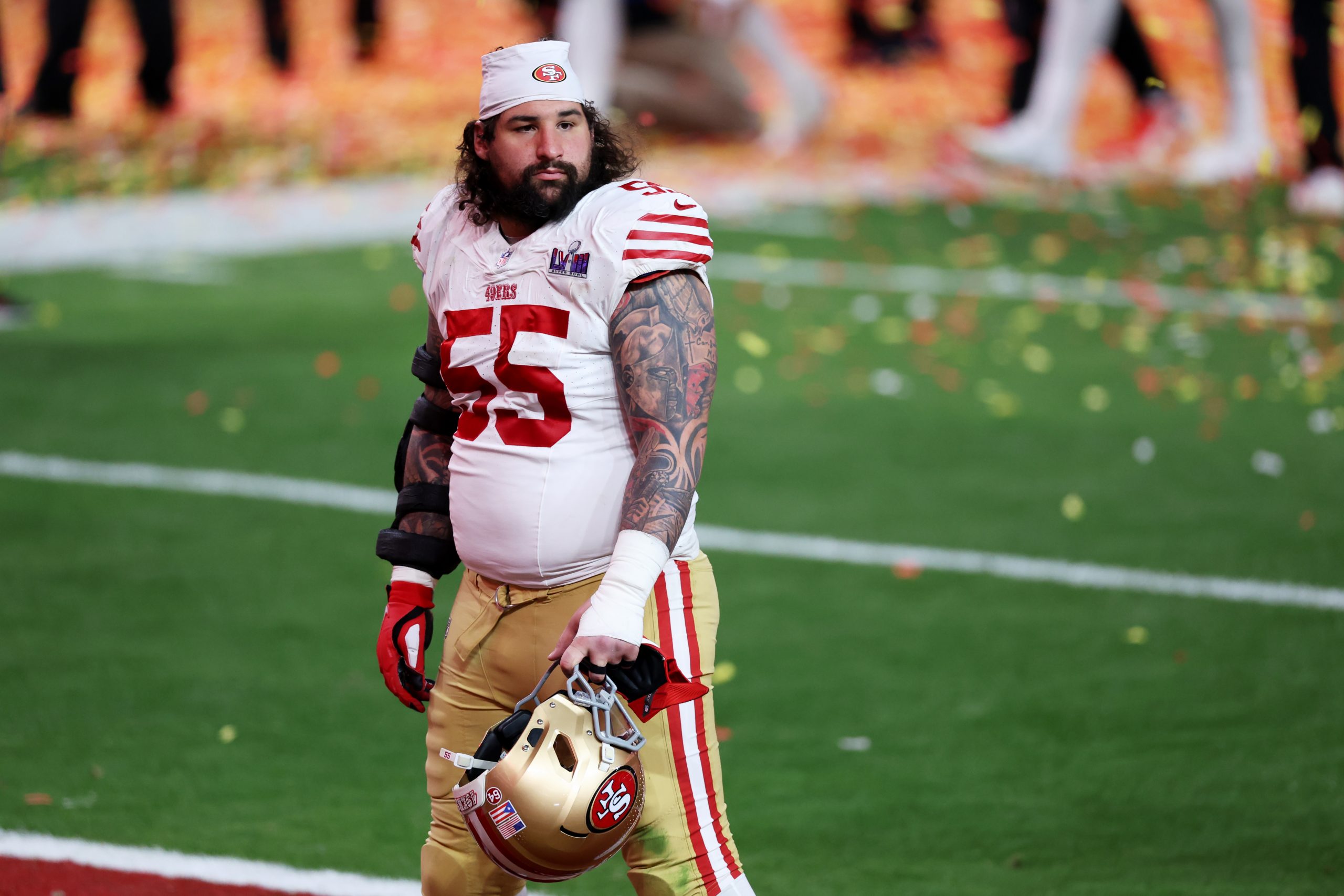 Jon Feliciano #55 of the San Francisco 49ers reacts after losing to the Kansas City Chiefs 25-22 in...