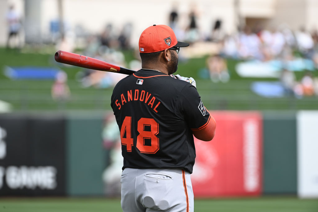Pablo Sandoval #48 of the San Francisco Giants prepares for a spring training game against the Texa...