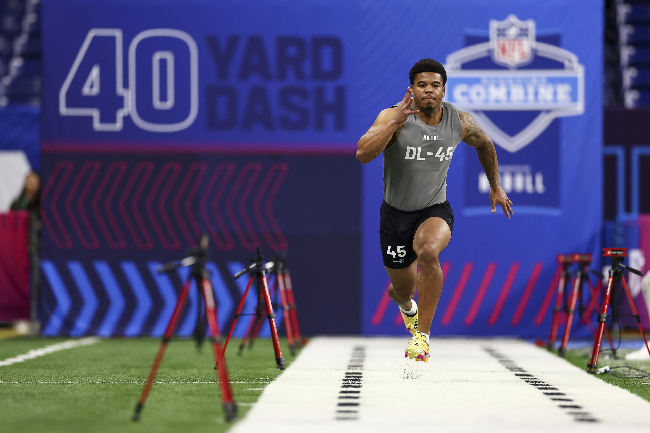 Chop Robinson #DL45 of Penn State runs the the 40-yard dash during the NFL Combine at Lucas Oil Sta...