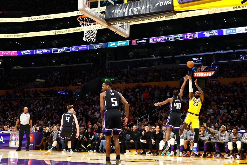LeBron James #23 of the Los Angeles Lakers takes a shot against the Sacramento Kings in the second ...