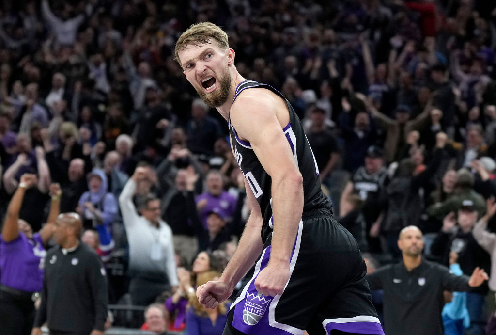 Domantas Sabonis #10 of the Sacramento Kings reacts after a slam dunks giving the Kings the lead ag...