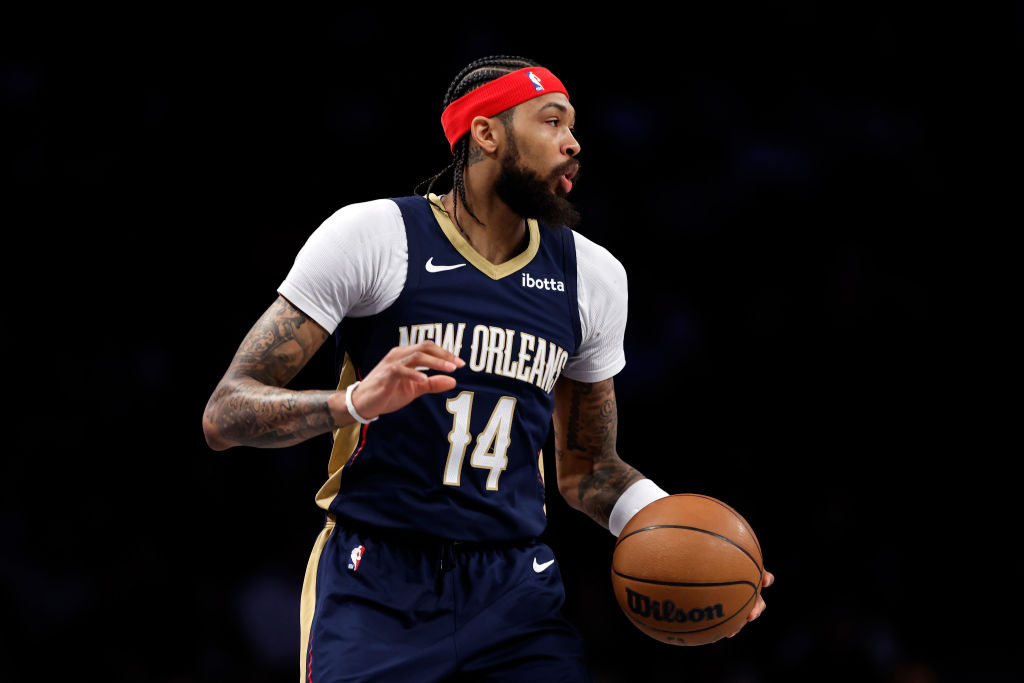 Brandon Ingram #14 of the New Orleans Pelicans dribbles during the first half against the Brooklyn ...