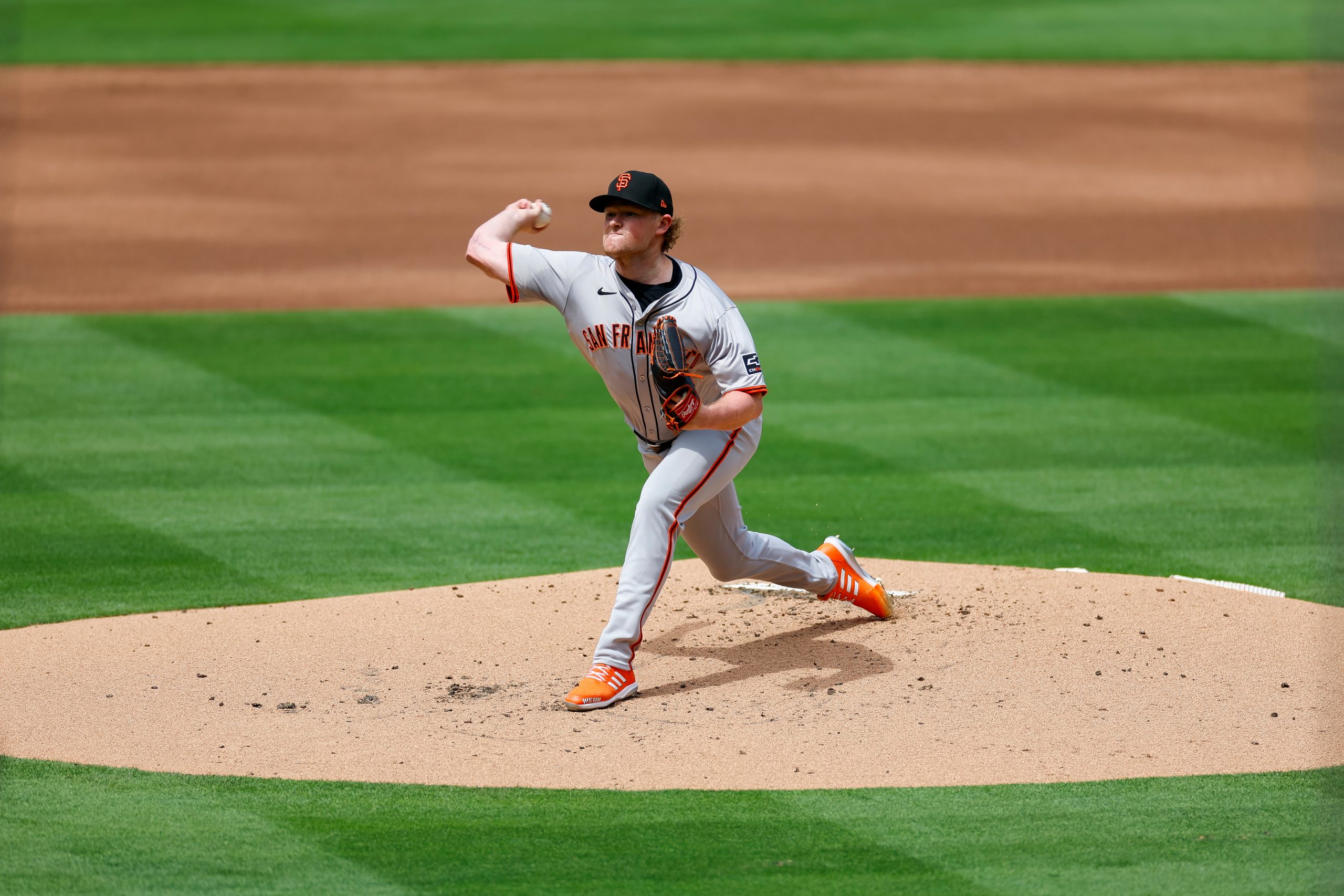 Logan Webb #62 of the San Francisco Giants pitches in the first inning during an Opening Day game a...