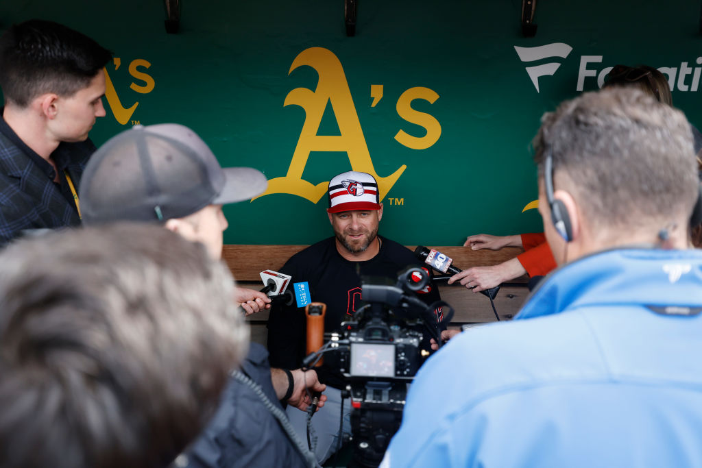 Manager Stephen Vogt #12 of the Cleveland Guardians talks to the media prior to the game between th...