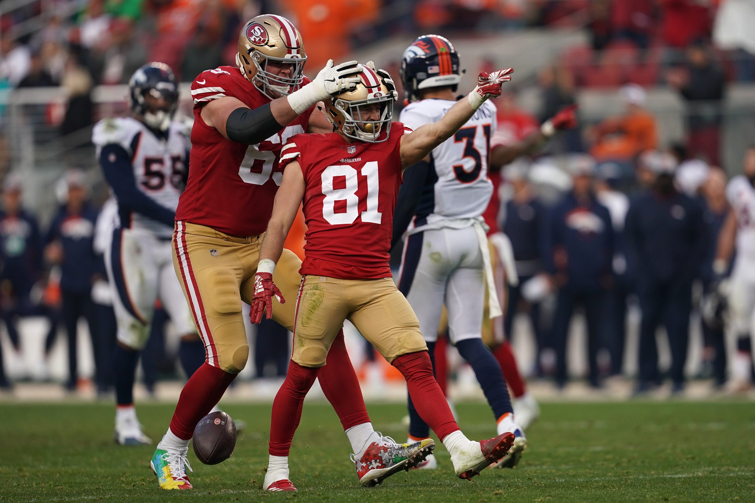 Trent Taylor #81 of the San Francisco 49ers reacts after a first down against the Denver Broncos du...