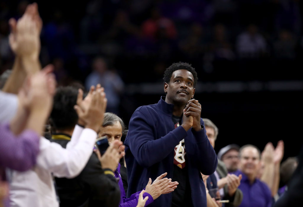 Former Sacramento Kings player Chris Webber is acknowledged by the crowd during the Kings game agai...