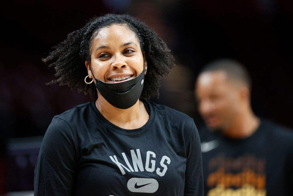 Assistant coach Lindsey Harding of the Sacramento Kings looks on before the game against the Portla...