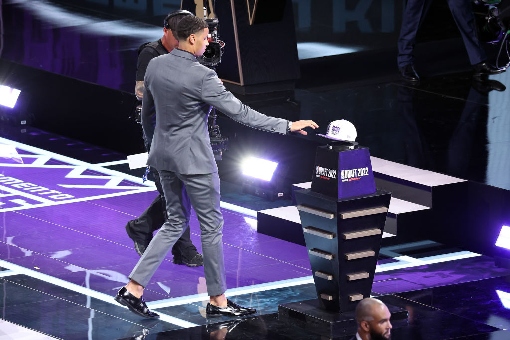Keegan Murray grabs a hat after being drafted 4th overall by the Sacramento Kings during the 2022 N...