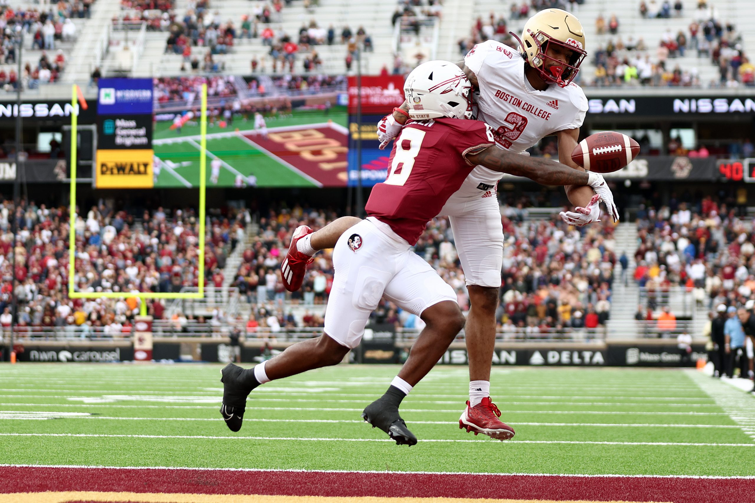 Renardo Green #8 of the Florida State Seminoles breaks up a pass intended for Joseph Griffin Jr. #2...