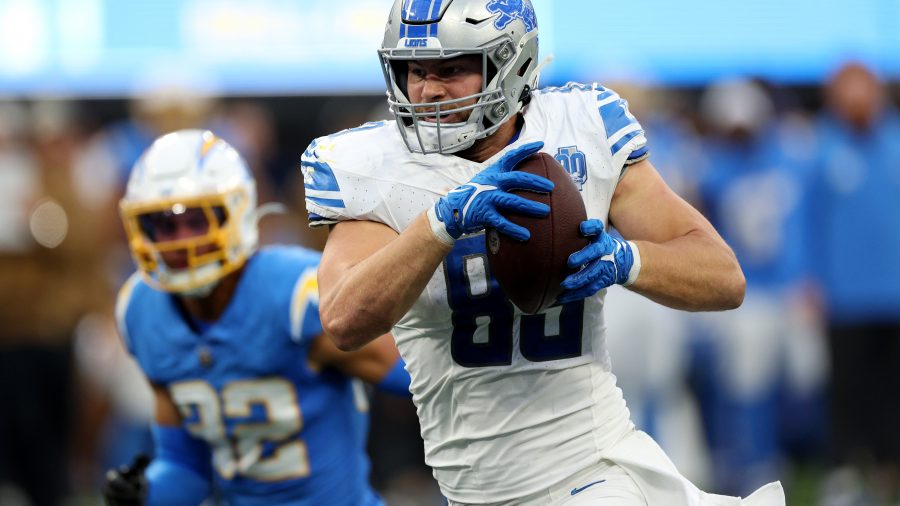 Brock Wright #89 of the Detroit Lions runs with the ball for a touchdown during the fourth quarter against the Los Angeles Chargers at SoFi Stadium on November 12, 2023 in Inglewood, California.