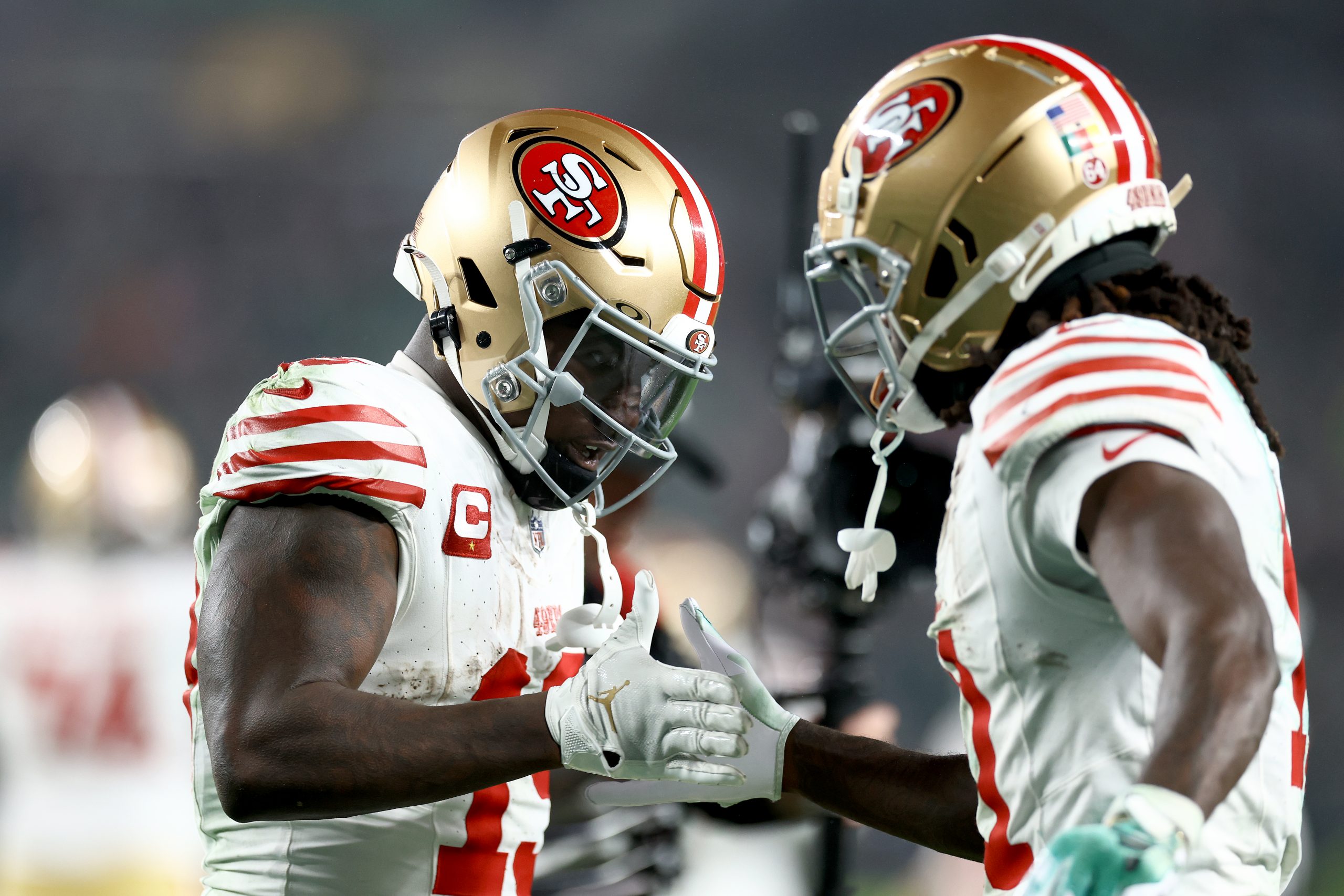 Deebo Samuel #19 of the San Francisco 49ers celebrates after a touchdown with Brandon Aiyuk #11 dur...