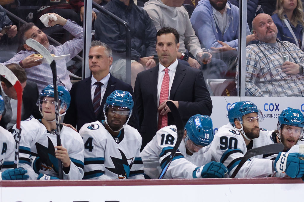 Head coach David Quinn of the San Jose Sharks watches from the bench during the NHL game at Mullett...