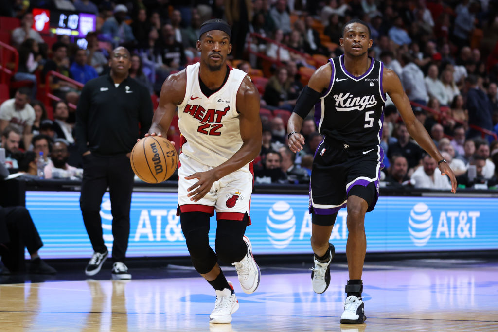Jimmy Butler #22 of the Miami Heat dribbles the ball against the Sacramento Kings during the fourth...