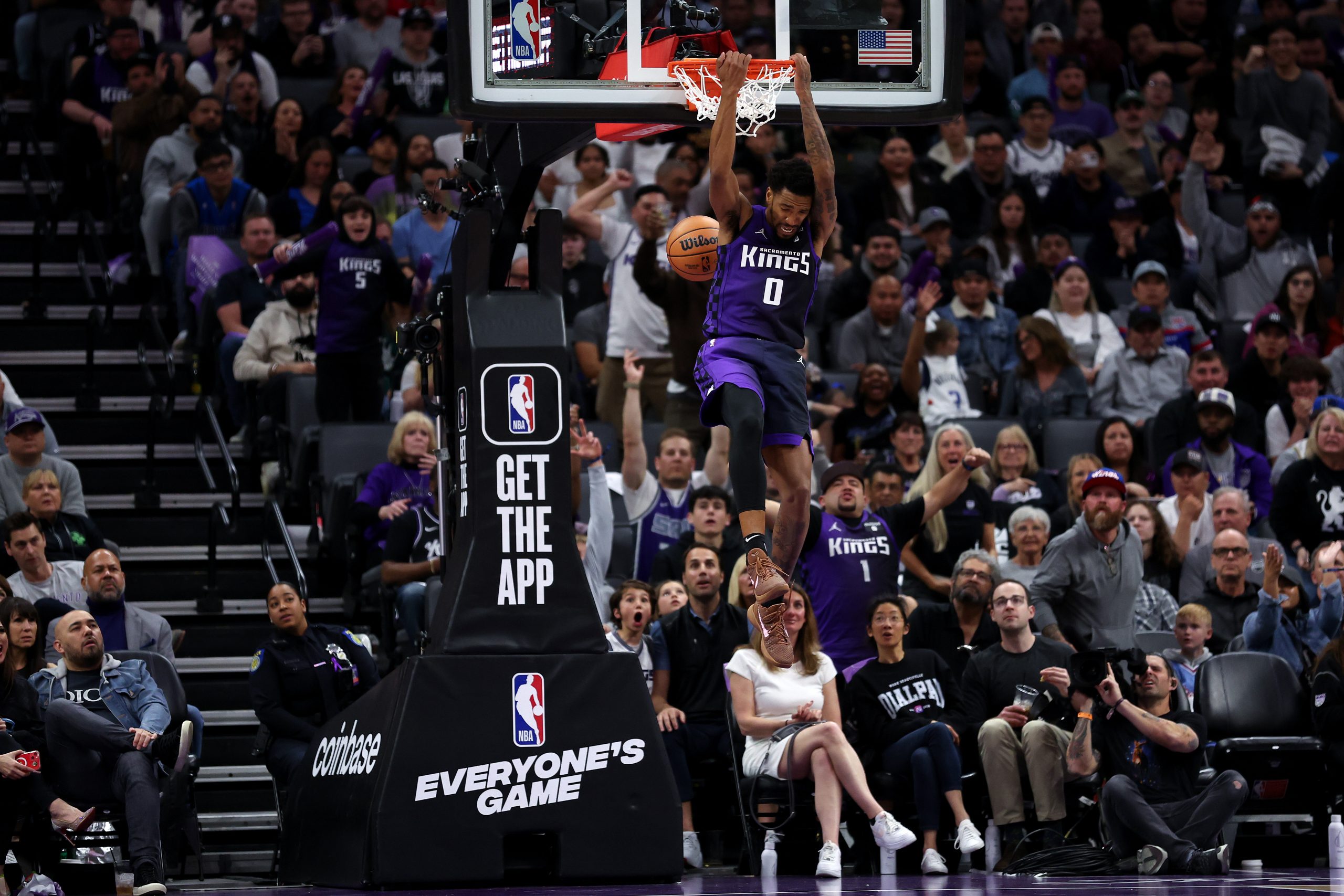 Malik Monk #0 of the Sacramento Kings dunks the ball against the Dallas Mavericks in the second hal...