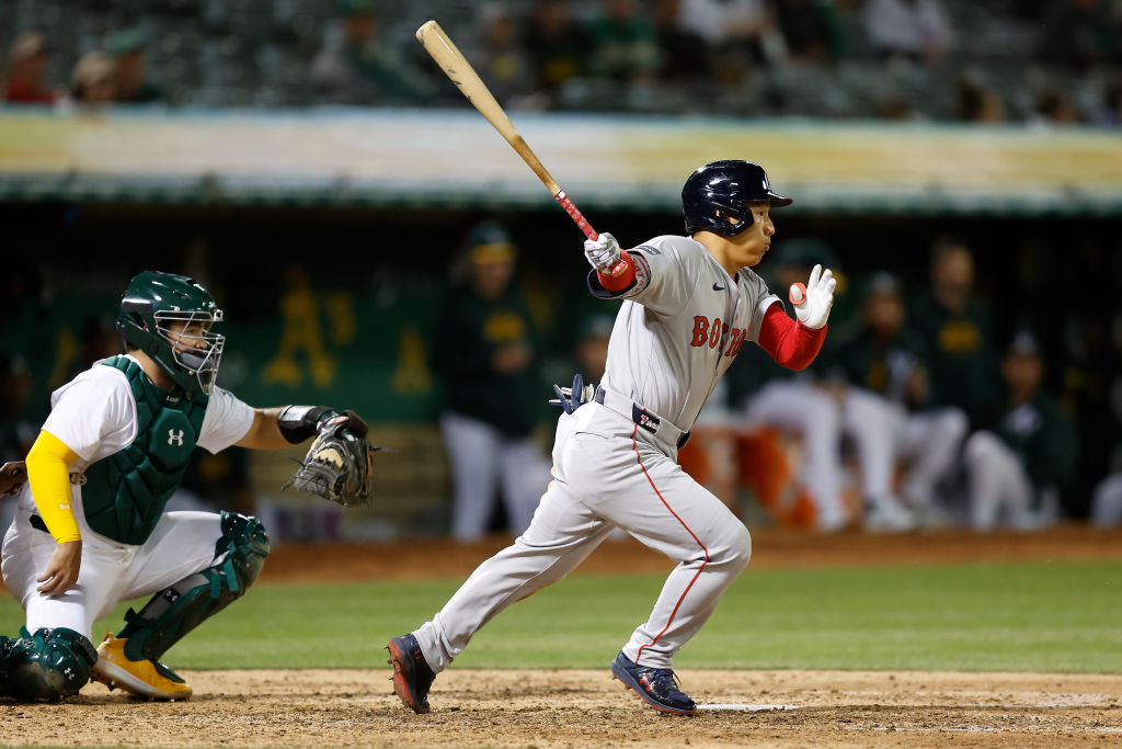 Masataka Yoshida #7 of the Boston Red Sox grounds into a force out in the top of the sixth inning a...