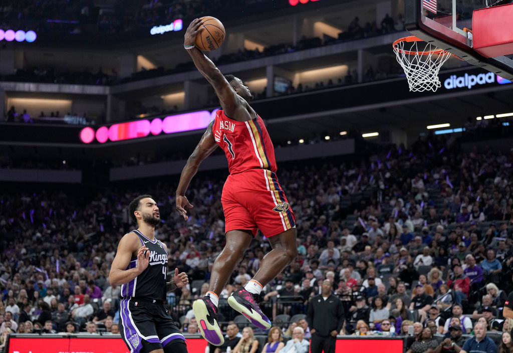 Zion Williamson #1 of the New Orleans Pelicans goes up for a slam dunk against the Sacramento Kings...