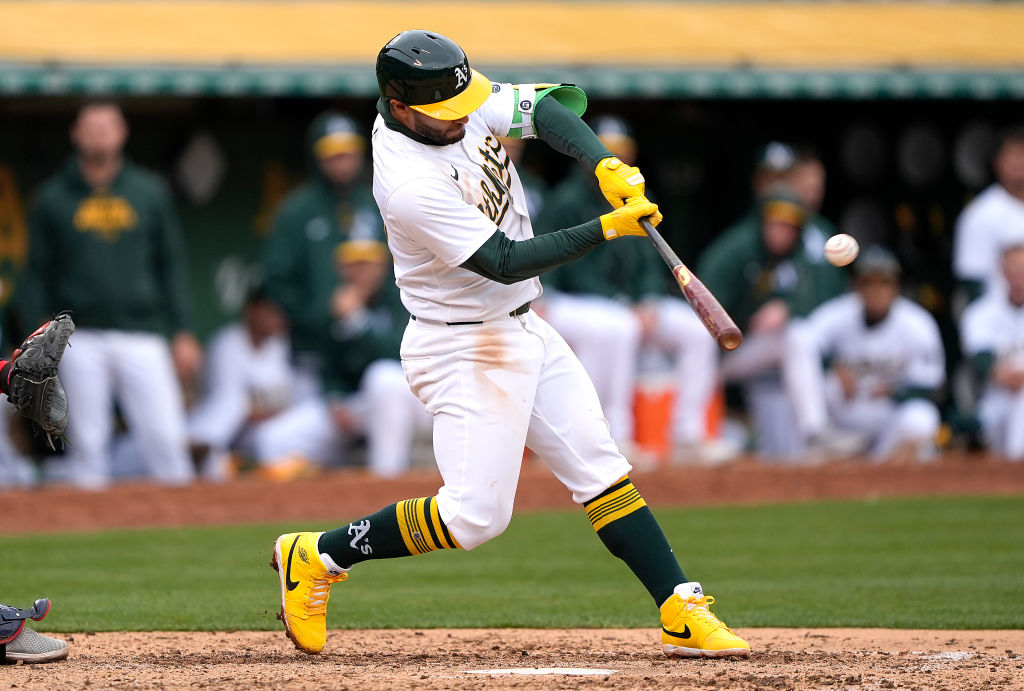 Abraham Toro #31 of the Oakland Athletics hits an rbi double scoring Nick Allen #10 against the Was...