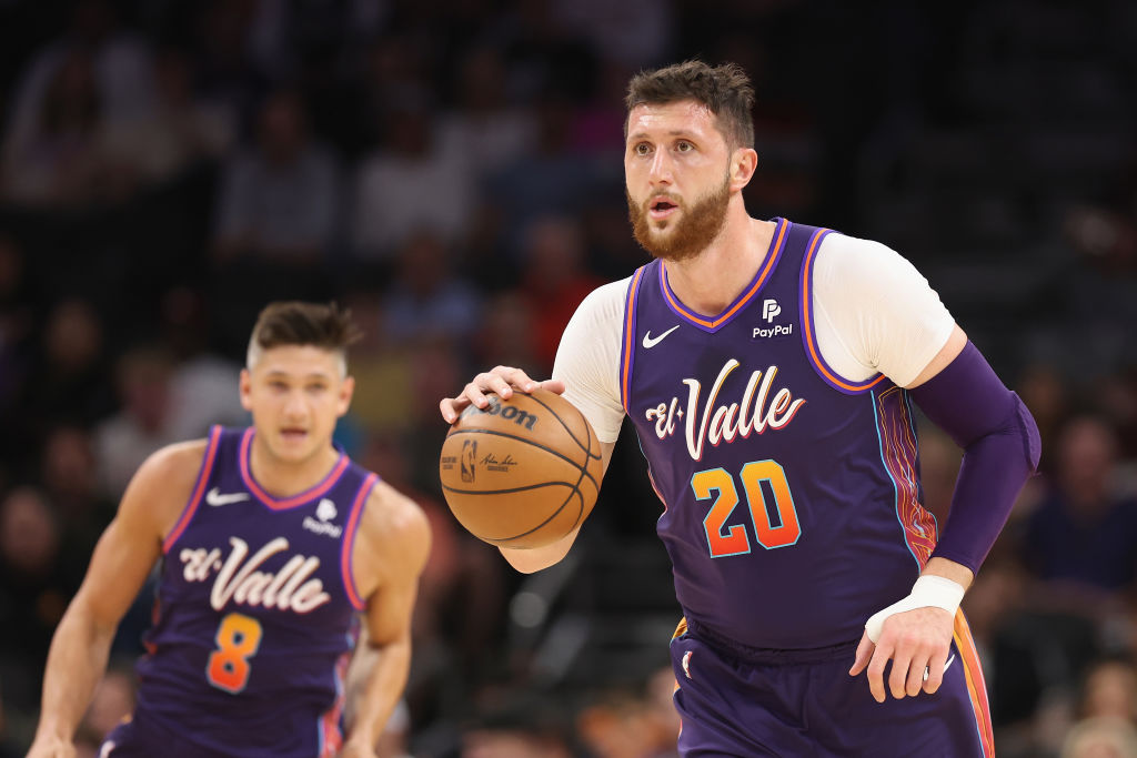 Jusuf Nurkic #20 of the Phoenix Suns handles the ball during the first half of the NBA game at Foot...