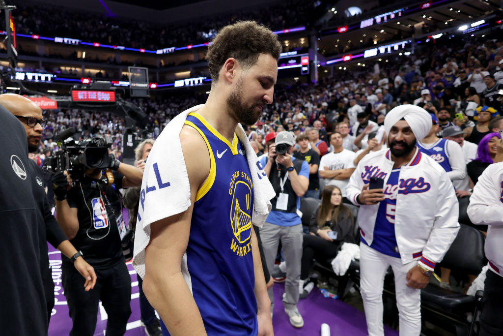 Klay Thompson #11 of the Golden State Warriors walks off the court after losing to the Sacramento K...