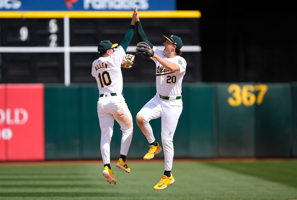 Nick Allen #10 and Zack Gelof #20 of the Oakland Athletics celebrates defeating the St. Louis Cardi...