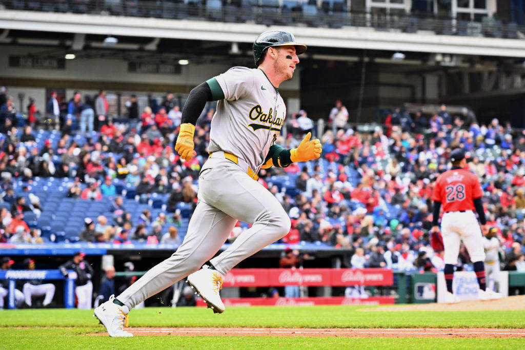 Brent Rooker #25 of the Oakland Athletics rounds the bases on a solo homer during the fourth inning...