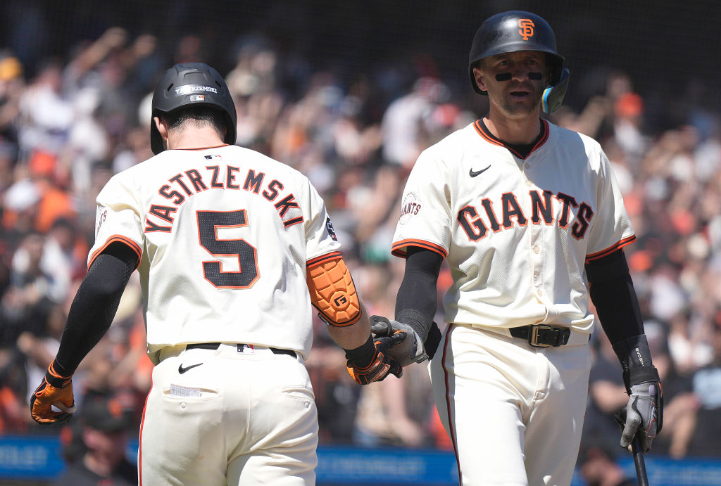 SAN FRANCISCO, CALIFORNIA - APRIL 21: Mike Yastrzemski #5 of the San Francisco Giants is congratula...