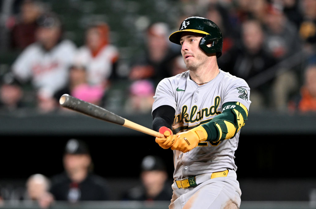 BALTIMORE, MARYLAND - APRIL 26: Brent Rooker #25 of the Oakland Athletics drives in the game winnin...