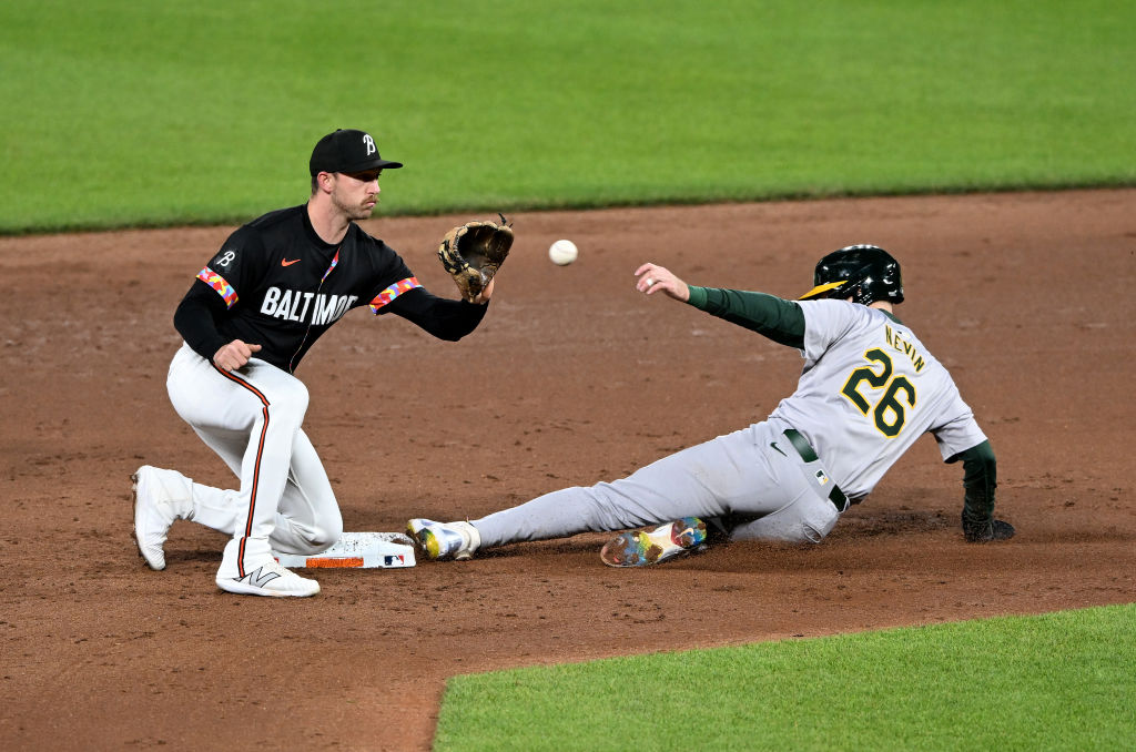 BALTIMORE, MARYLAND - APRIL 26: Tyler Nevin #26 of the Oakland Athletics steals second base in the ...