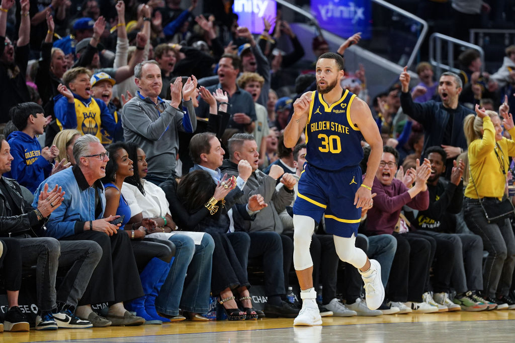 SAN FRANCISCO, CA - APRIL 12: Stephen Curry #30 of the Golden State Warriors reacts to making a bas...