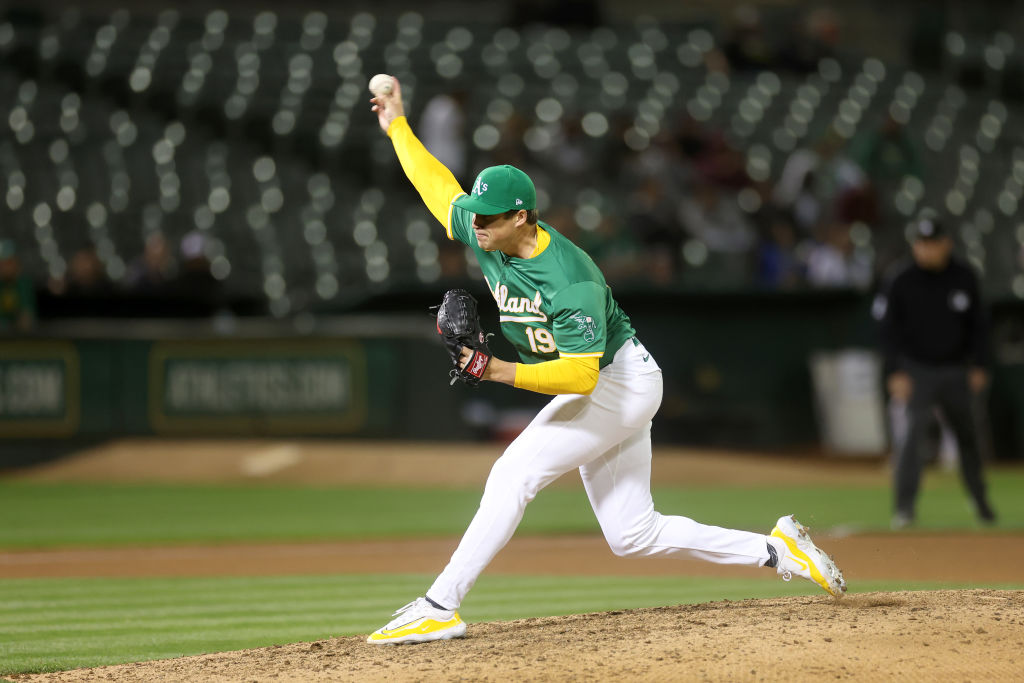 OAKLAND, CALIFORNIA - APRIL 30: Mason Miller #19 of the Oakland Athletics pitches against the Pitts...