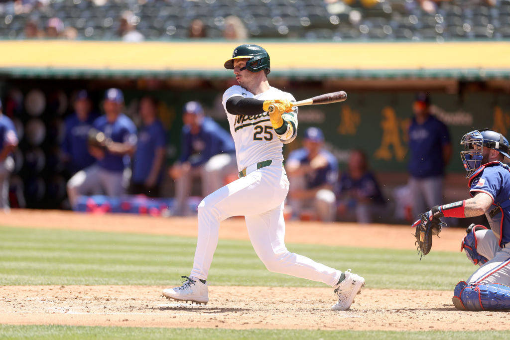 OAKLAND, CALIFORNIA - MAY 07: Brent Rooker #25 of the Oakland Athletics hits a single that scored a...