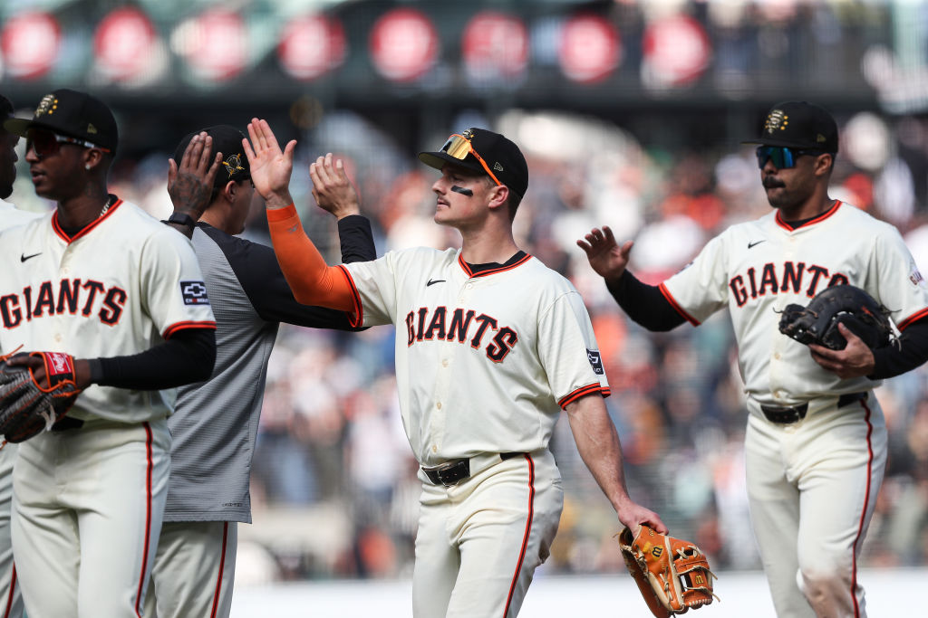 SAN FRANCISCO, CALIFORNIA - MAY 18: Matt Chapman #26 of the San Francisco Giants (C) celebrates the...