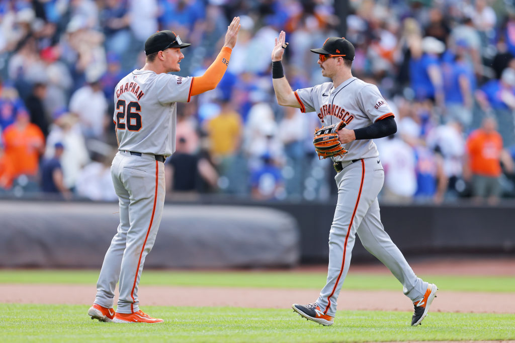 NEW YORK, NEW YORK - MAY 25: Mike Yastrzemski #5 and Matt Chapman #26 of the San Francisco Giants c...