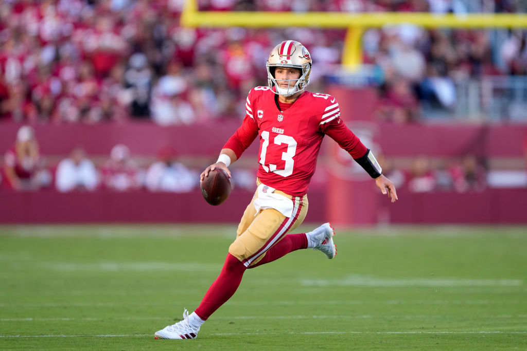 SANTA CLARA, CALIFORNIA - SEPTEMBER 09: Quarterback Brock Purdy #13 of the San Francisco 49ers scra...