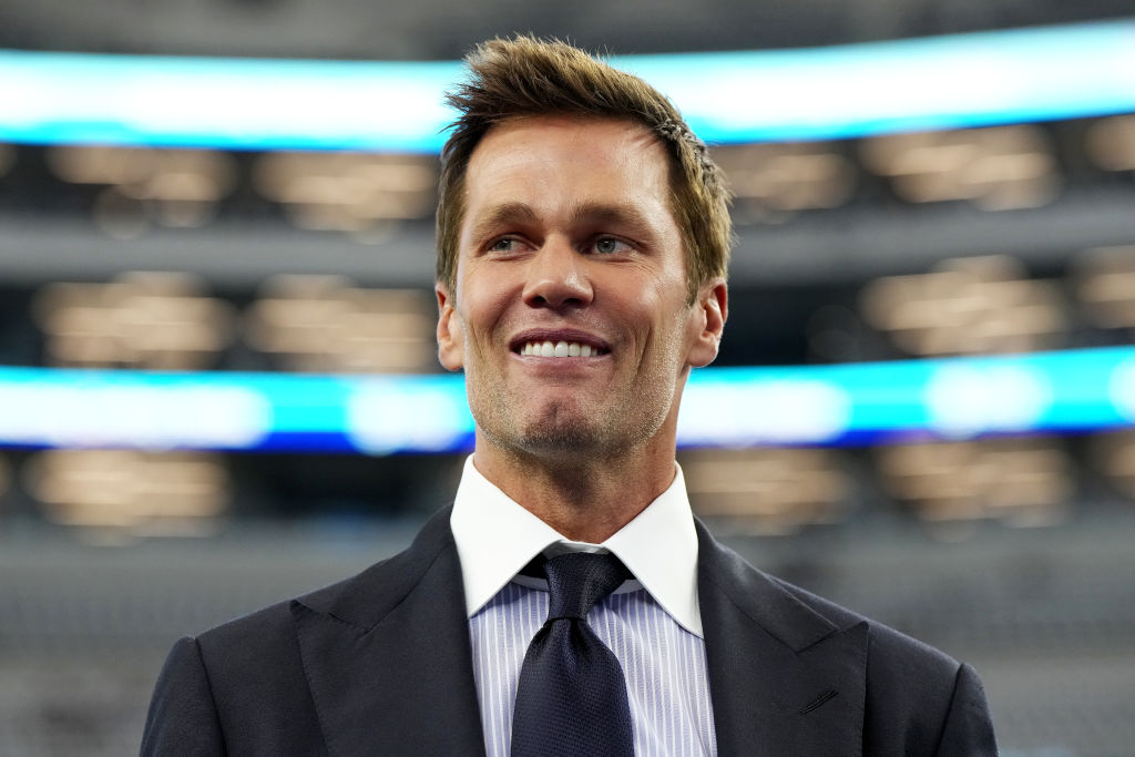 ARLINGTON, TEXAS - SEPTEMBER 15: Tom Brady looks on prior to the game at AT&T Stadium on Septem...