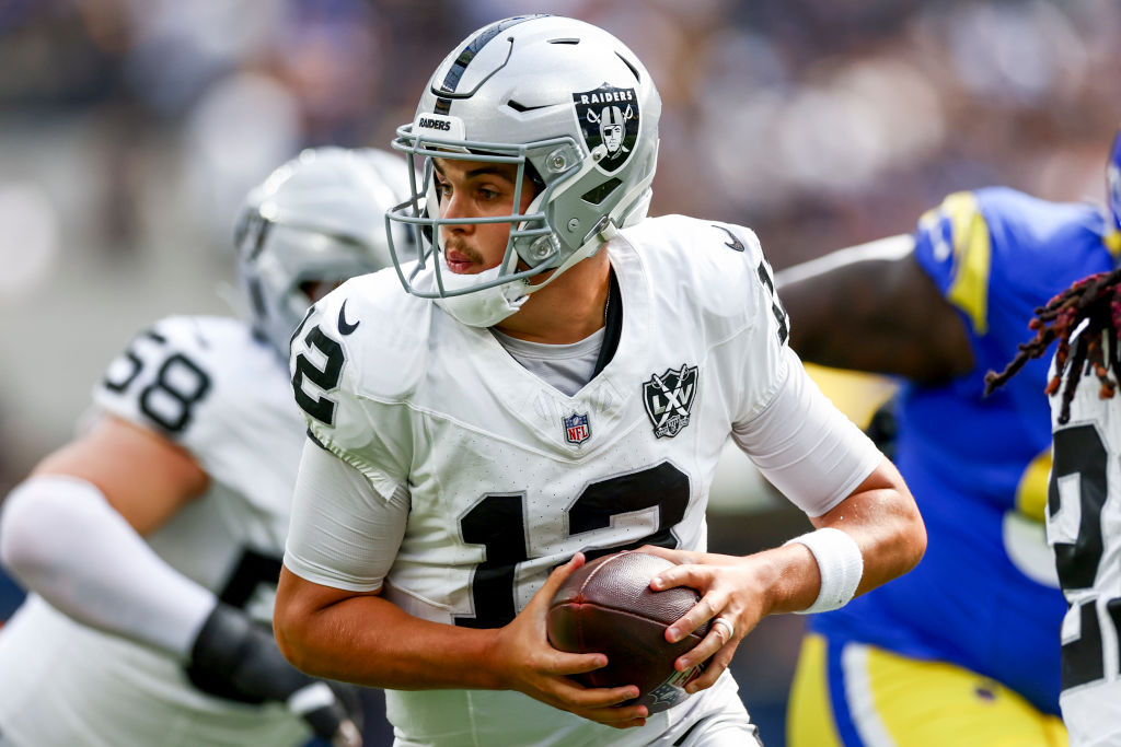 INGLEWOOD, CALIFORNIA - OCTOBER 20: Aidan O'Connell #12 of the Las Vegas Raiders runs with the ball...