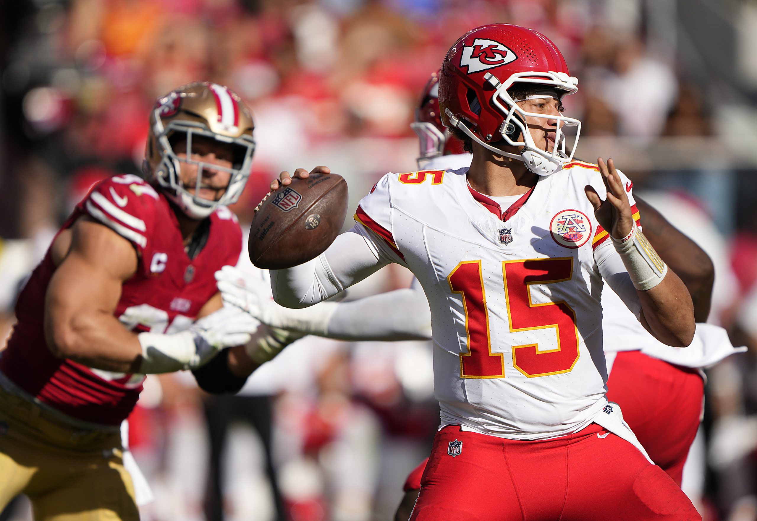 Quarterback Patrick Mahomes #15 of the Kansas City Chiefs looks to pass during the third quarter at...