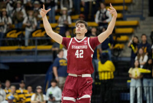 BERKELEY, CALIFORNIA - DECEMBER 07: Maxime Raynaud #42 of the Stanford Cardinal reacts after making a three-point shot against the California Golden Bears during the first half at Haas Pavilion on December 07, 2024 in Berkeley, California. (Photo by Thearon W. Henderson/Getty Images)