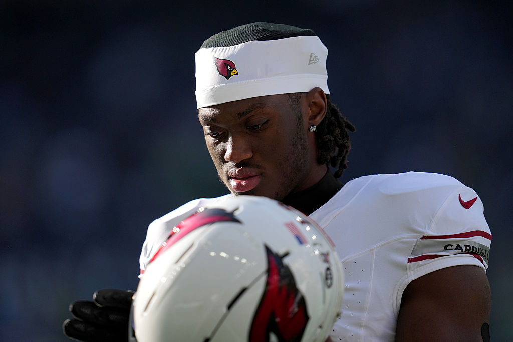 SEATTLE, WASHINGTON - NOVEMBER 09: Marvin Harrison Jr. #18 of the Arizona Cardinals looks on before...