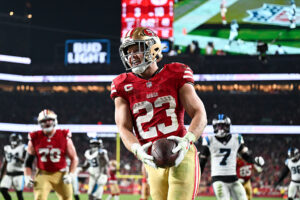 SANTA CLARA, CALIFORNIA - NOVEMBER 24: Christian McCaffrey #23 of the San Francisco 49ers runs into the end zone for a touchdown in the third quarter of the game against the Carolina Panthers at Levi's Stadium on November 24, 2025 in Santa Clara, California. (Photo by Thien-An Truong/Getty Images)