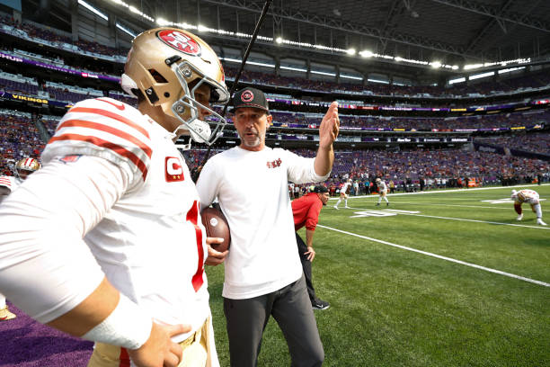 MINNEAPOLIS, MN - SEPTEMBER 15: Brock Purdy #13 and Head Coach Kyle Shanahan of the San Francisco 4...