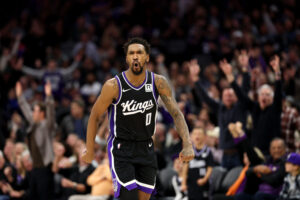 SACRAMENTO, CALIFORNIA - JANUARY 03: Malik Monk #0 of the Sacramento Kings reacts after making a basket against the Memphis Grizzlies in the second half at Golden 1 Center on January 03, 2025 in Sacramento, California. NOTE TO USER: User expressly acknowledges and agrees that, by downloading and/or using this photograph, user is consenting to the terms and conditions of the Getty Images License Agreement. (Photo by Ezra Shaw/Getty Images)