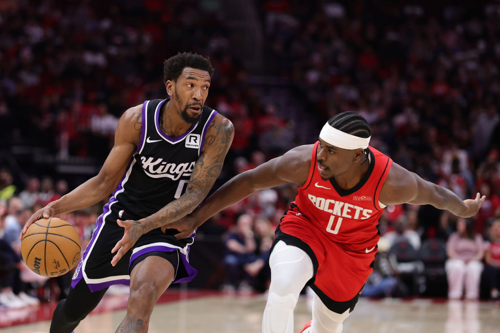 HOUSTON, TEXAS - MARCH 01: Malik Monk #0 of the Sacramento Kings works against Aaron Holiday #0 of ...