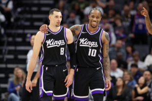 SACRAMENTO, CALIFORNIA - MARCH 07: DeMar DeRozan #10 and Zach LaVine #8 of the Sacramento Kings hug during their game against the San Antonio Spurs during the second half at Golden 1 Center on March 07, 2025 in Sacramento, California. NOTE TO USER: User expressly acknowledges and agrees that, by downloading and/or using this photograph, user is consenting to the terms and conditions of the Getty Images License Agreement. (Photo by Ezra Shaw/Getty Images)