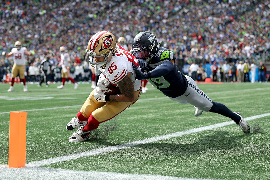 SEATTLE, WASHINGTON - SEPTEMBER 07: George Kittle #85 of the San Francisco 49ers scores a touchdown...