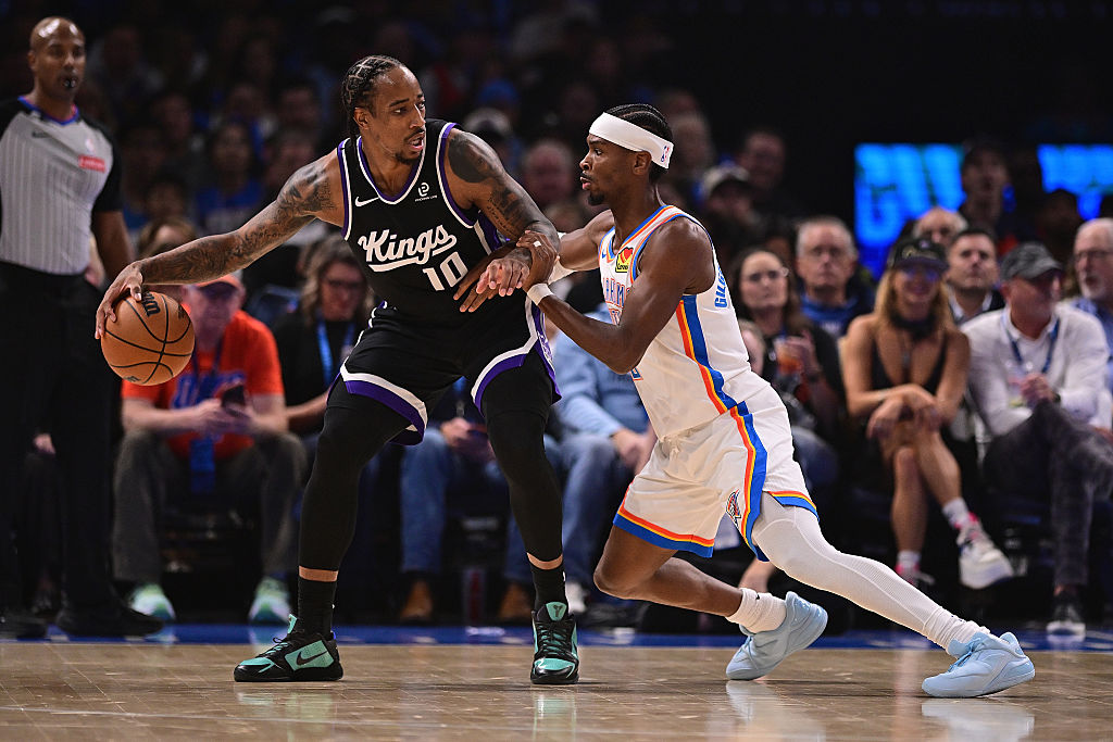 OKLAHOMA CITY, OKLAHOMA - OCTOBER 28: DeMar DeRozan #10 of the Sacramento Kings handles the ball in...