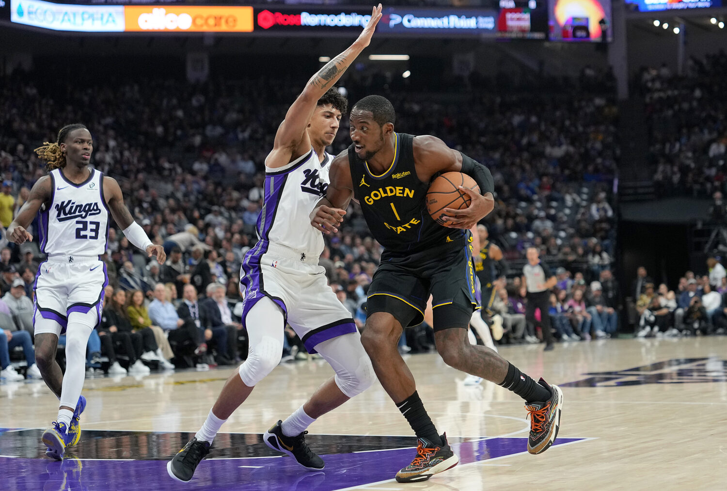 SACRAMENTO, CALIFORNIA - NOVEMBER 05: Jonathan Kuminga #1 of the Golden State Warriors moves toward...