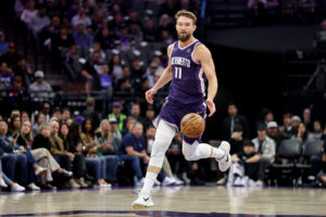 SACRAMENTO, CALIFORNIA - NOVEMBER 12: Domantas Sabonis #11 of the Sacramento Kings dribbles the ball against the Atlanta Hawks at Golden 1 Center on November 12, 2025 in Sacramento, California. NOTE TO USER: User expressly acknowledges and agrees that, by downloading and/or using this photograph, user is consenting to the terms and conditions of the Getty Images License Agreement. (Photo by Ezra Shaw/Getty Images)